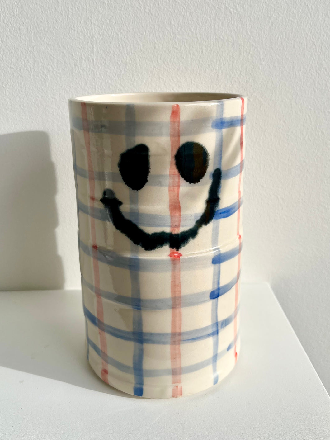 “You are funny” vase - blue & red grid