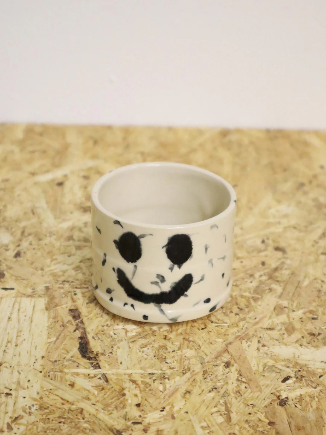 You are funny cup in black dots