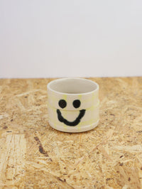 You are funny cup in yellow grid