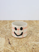 You are funny cup in pink grid