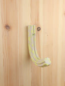 "Yellow drip" Exruded hanger
