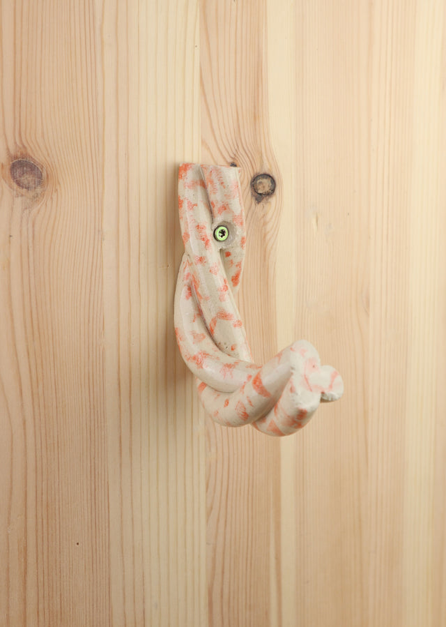 "Pink drip" extruded hanger